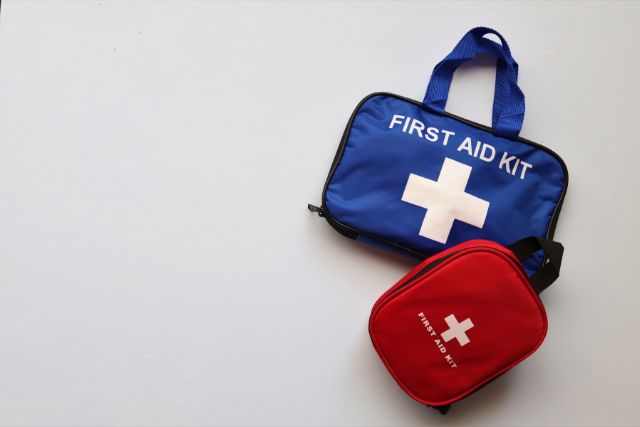 A photo of first aid kits on a white background.