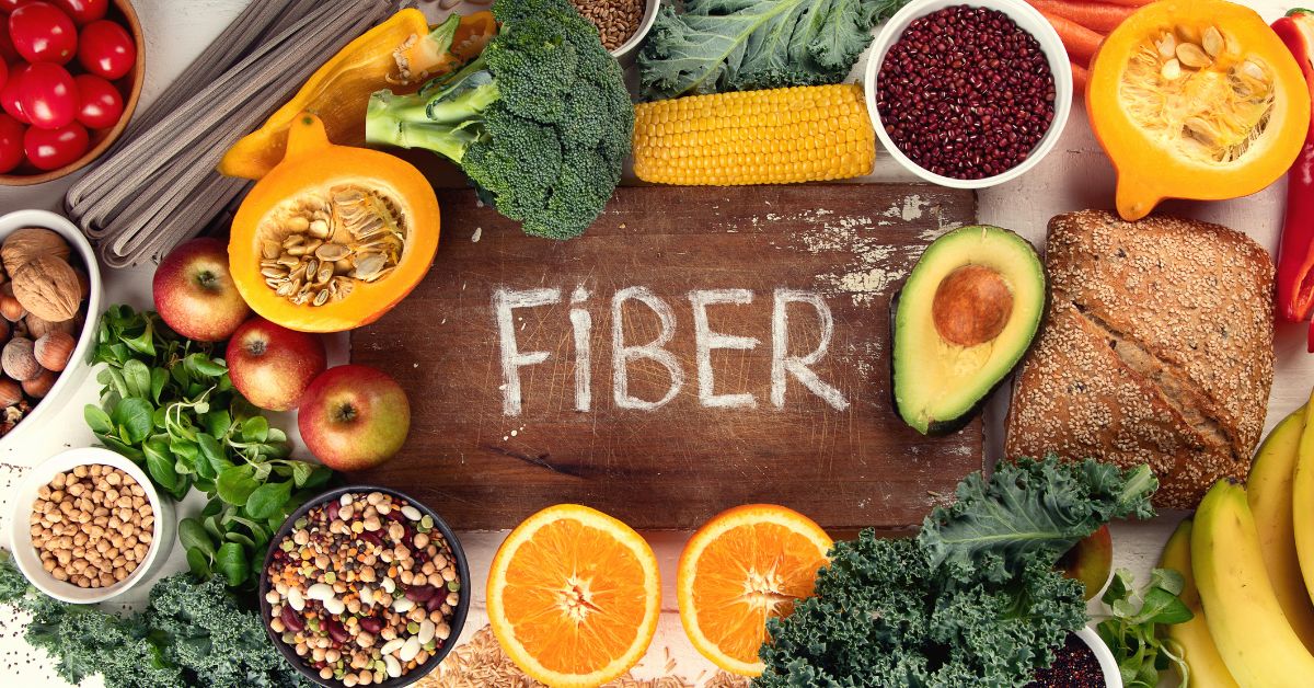 Different high fiber fruit, veggies , and nuts.